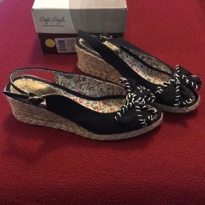 Cute black sandals with wedge heel